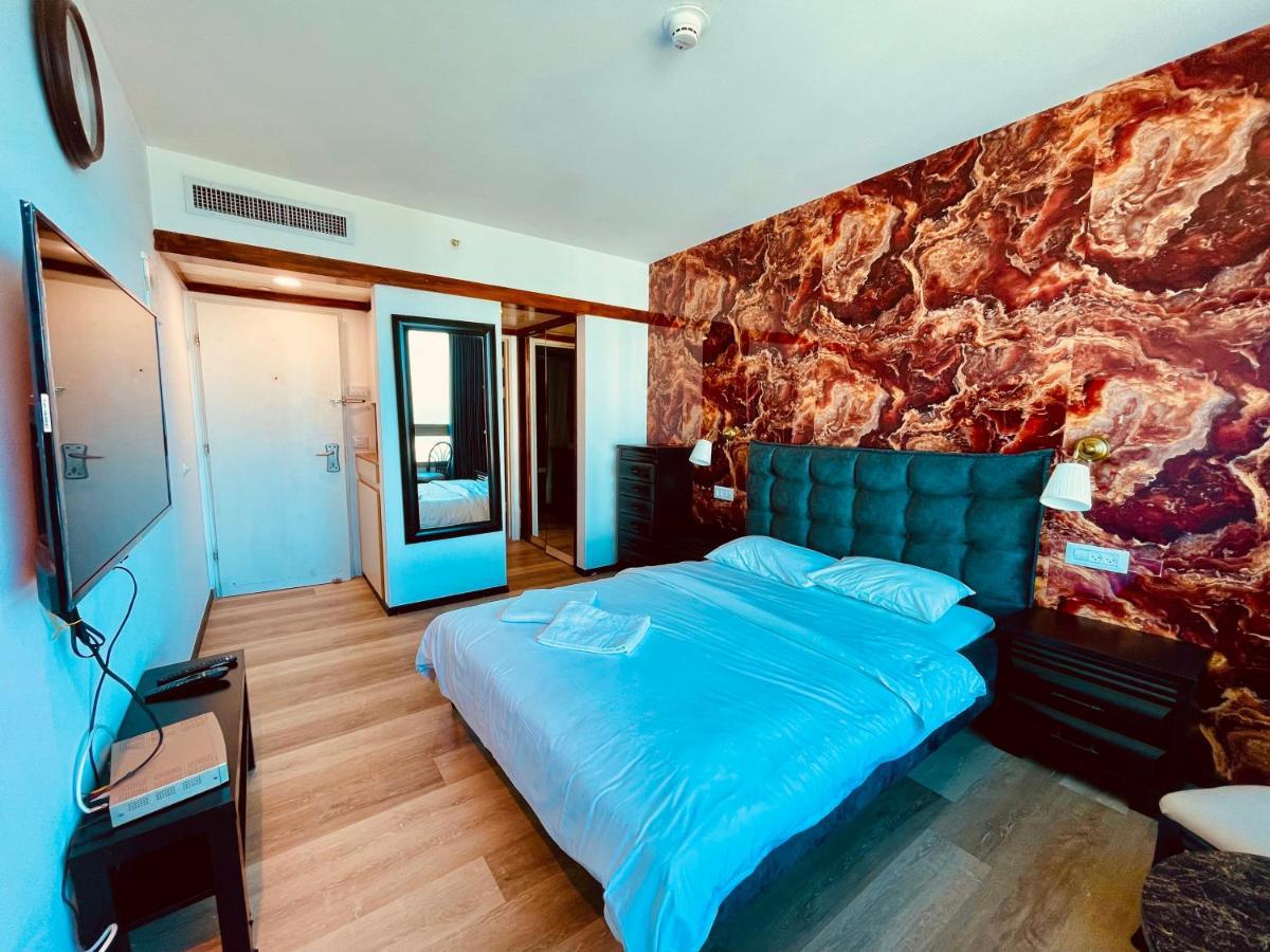 Carmel Holiday Apartments เนทันยา ภายนอก รูปภาพ